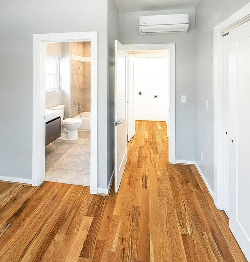 WoodFloorz.com | 3 1/4" White Oak #2 Common hardwood flooring will have color variations produced by the heartwood and sapwood present in the floor. Common grade will contain some light character such as: knots, mineral streaks, and color variation. Our 3/4" thick unfinished solid wood flooring is precision milled by NWFA standards or better and has a 4-sided tongue and groove for ease of installation.