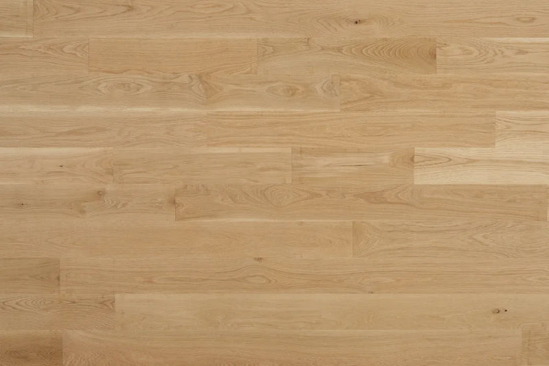 WoodFloorz.Com | 5" White Oak Select & Better hardwood flooring will have very consistent color and grain throughout. Select & Better grade will also be mostly free of imperfections such as knots and minerals streaks and provide an overall clean appearance. Our 3/4" thick unfinished solid wood flooring is precision milled by NWFA standards or better and has a 4 sided tongue and groove for ease of installation.